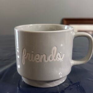 White Ceramic Mug with 'Friends' Inscription